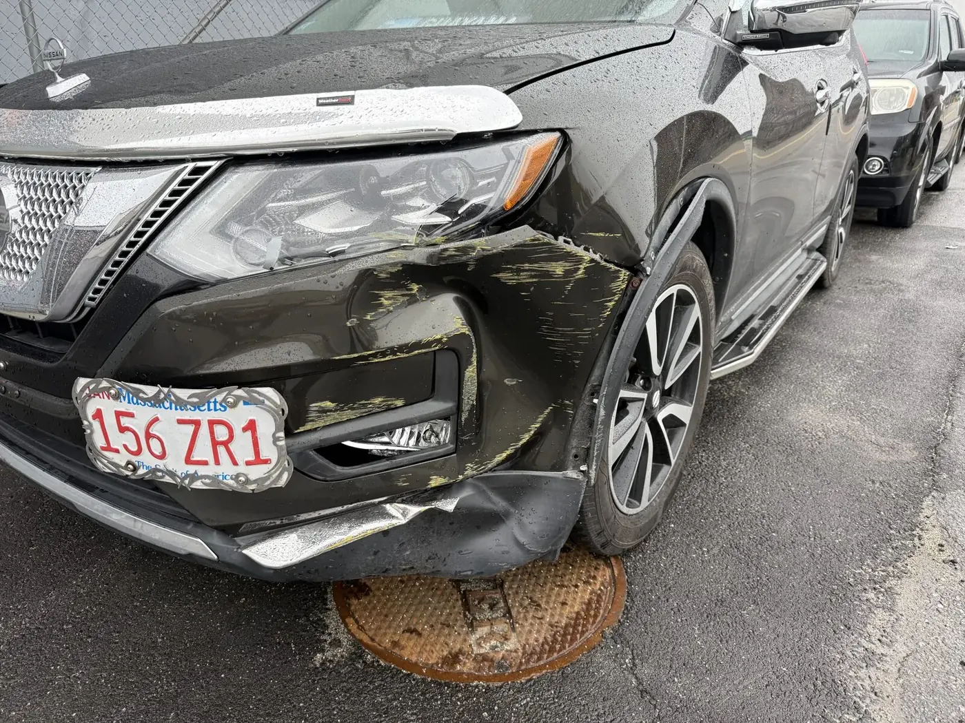 Damaged vehicle panel before collision repair in Worcester, MA