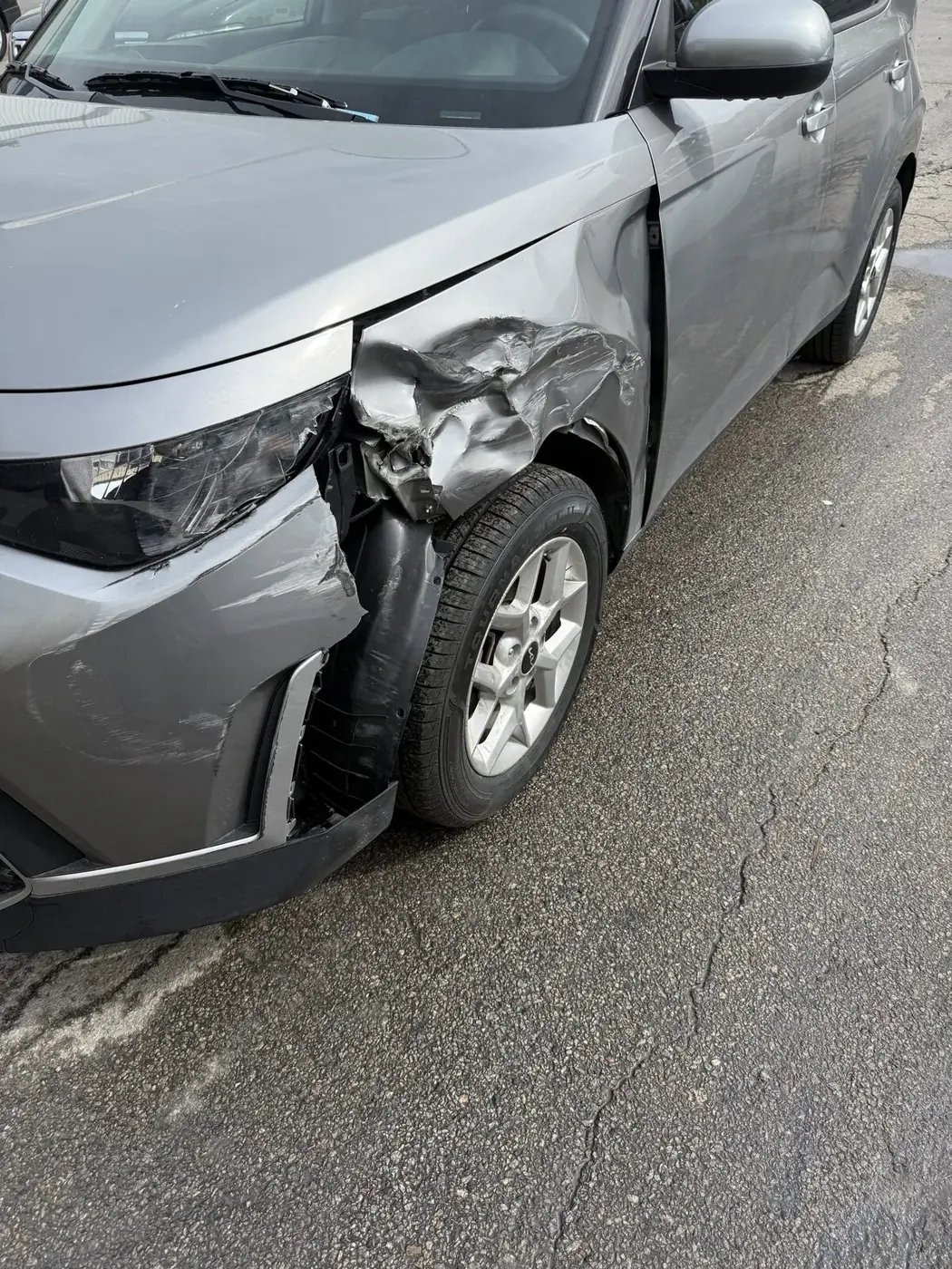 Vehicle before and during body repair at the Worcester shop